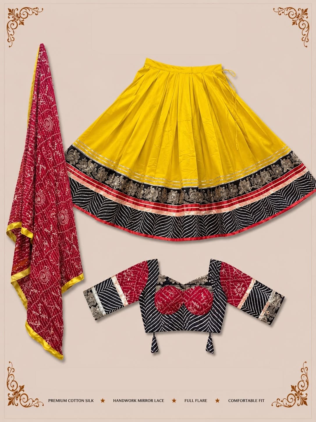 Yellow pleated skirt with a black floral and leheriya border, black-and-red bandhani blouse and a red bandhani dupatta